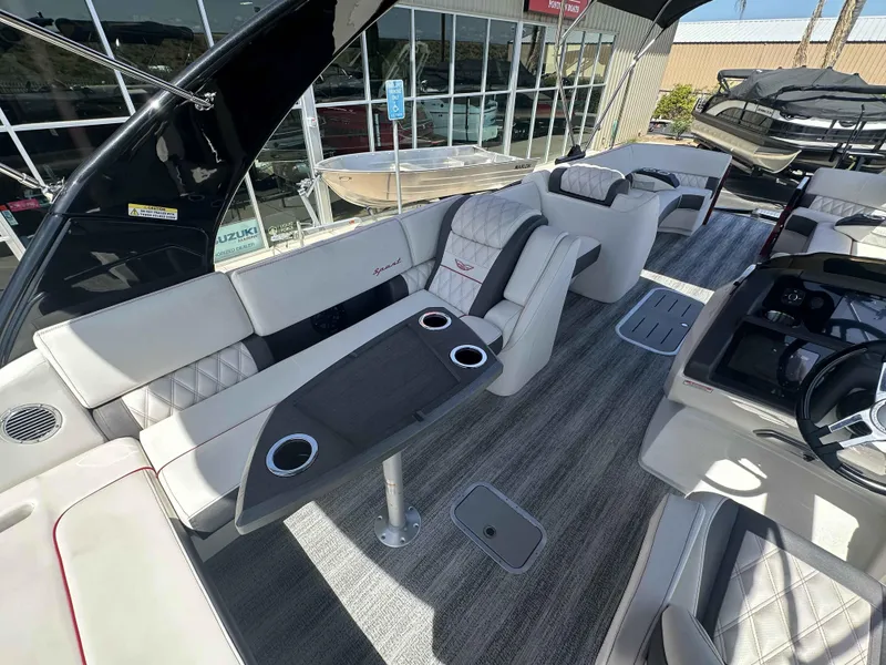 Slide: The Image of Luxurious interior of 2025 Bennington 25 RXSB pontoon boat with plush seating and modern design. - 14