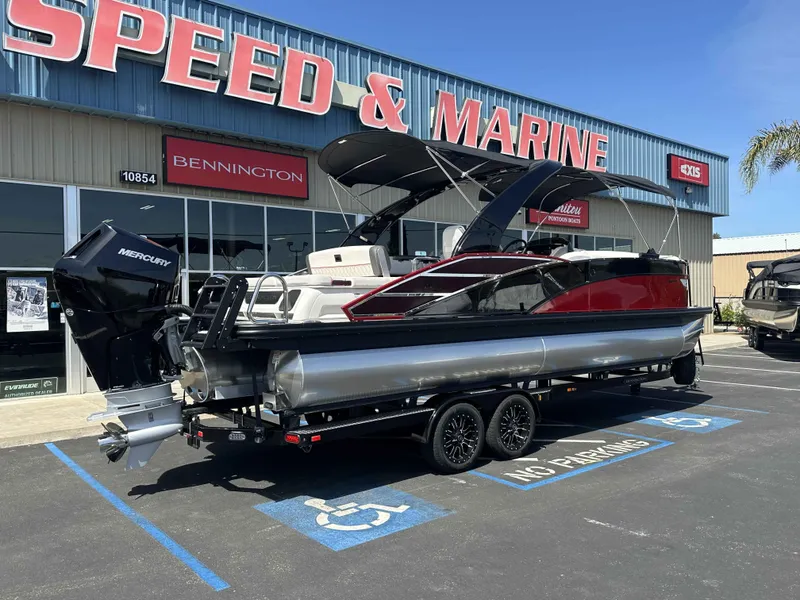 Slide: The Image of 2025 Bennington 25 RXSB pontoon boat at Speed & Marine dealership. - 24