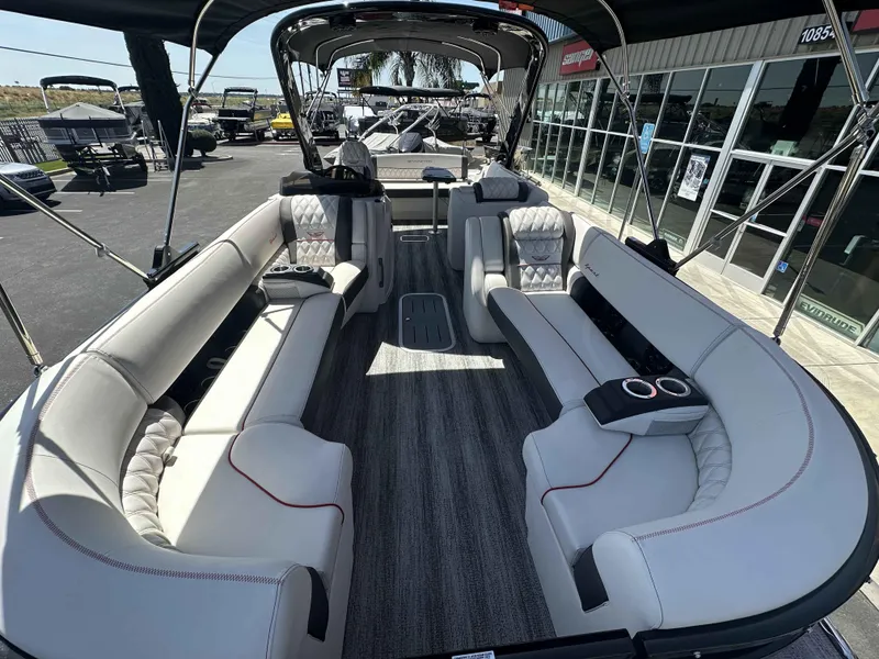 Slide: The Image of 2025 Bennington 25 RXSB pontoon boat interior with luxurious seating and modern design. - 7