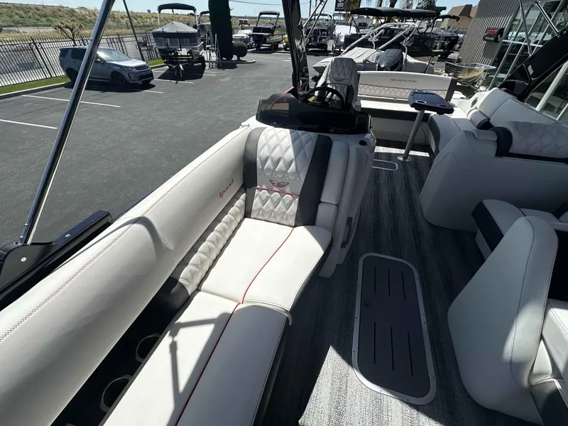 Slide: The Image of 2025 Bennington 25 RXSB boat interior with luxurious seating and modern design. - 9
