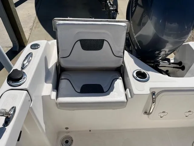 Slide: The Image of 2019 Wellcraft 18 CC boat seat and engine area, featuring modern design and functionality. - 6
