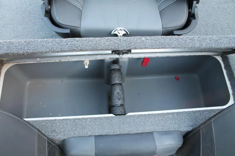 Slide: The Image of Open storage compartment in 2022 Tracker Pro Team 190 TX boat. - 13