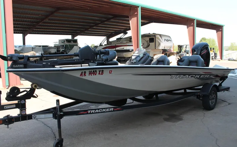 Slide: The Image of 2022 Tracker Pro Team 190 TX boat on trailer in storage facility. - 17
