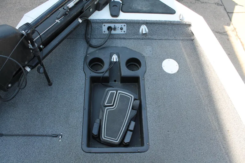 Slide: The Image of 2022 Tracker Pro Team 190 TX boat deck with pedal controls and cup holders. - 7