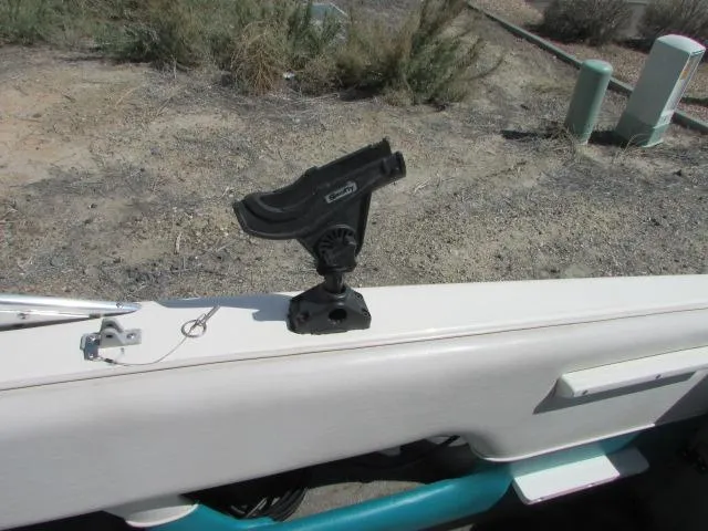 Slide: The Image of 1995 Seaswirl 180 boat with mounted fishing rod holder on deck. - 9