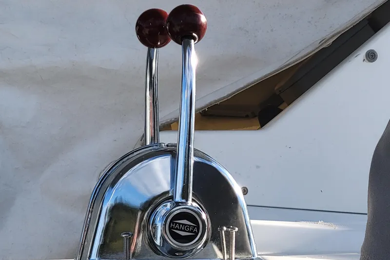 Slide: The Image of Chrome throttle controls on a 2011 Lagoon 450 catamaran. - 35