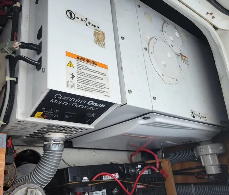 Slide: The Image of Cummins Onan marine generator in 2011 Lagoon 450 yacht engine room. - 45