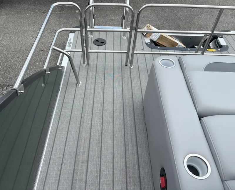 Slide: The Image of 2025 Bentley Pontoons Legacy 223 Swingback deck with seating and cup holders. - 13