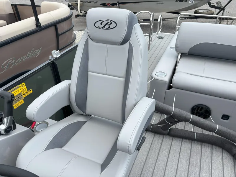Slide: The Image of 2025 Bentley Pontoons Legacy 223 Swingback interior with luxurious seating and modern design. - 21