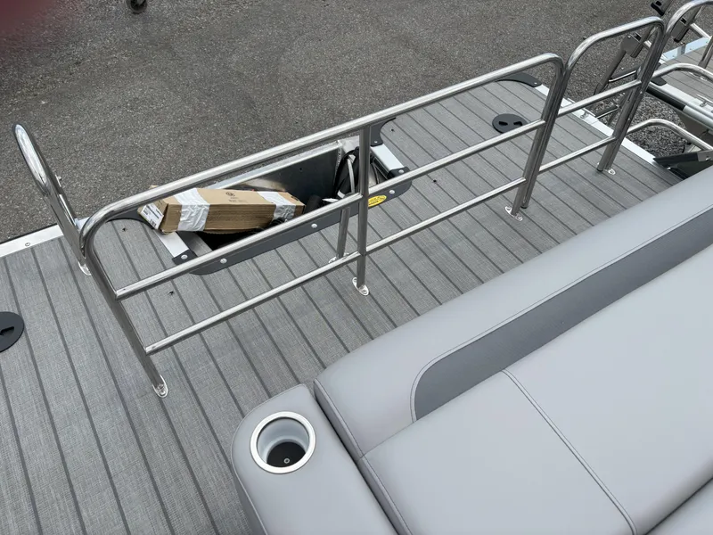 Slide: The Image of 2025 Bentley Pontoons Legacy 223 Swingback deck with railing and seating. - 22