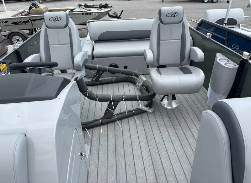 Slide: The Image of 2025 Bentley Pontoons Legacy 223 Swingback interior with plush seating and modern design. - 6