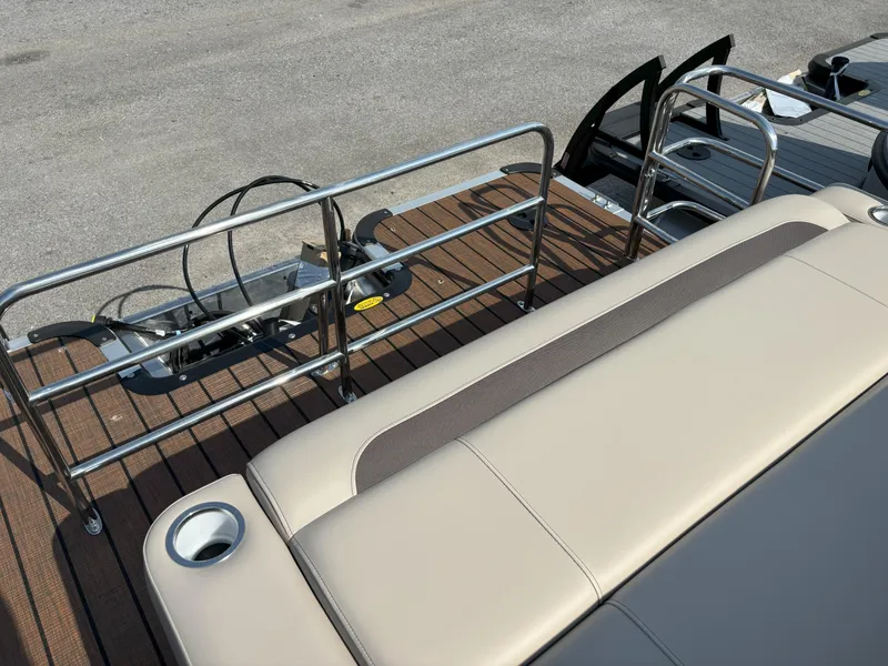 Slide: The Image of 2025 Bentley Pontoons Legacy 223 Swingback with sleek seating and stainless steel railings. - 9