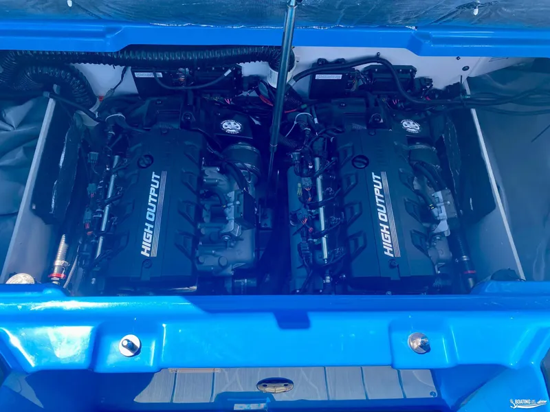 Slide: The Image of 2023 Yamaha Boats 222XE high output engines in blue compartment. - 10