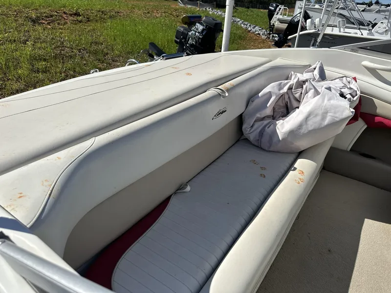 Slide: The Image of Interior of a 2007 Caravelle 182 186 boat with white seating and fabric. - 5