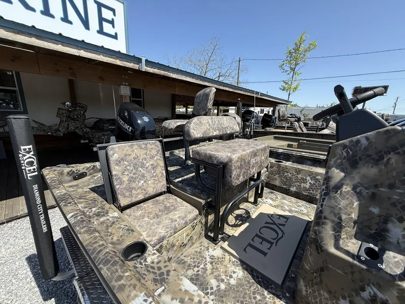 Slide: The Image of 2025 Excel Bay Pro 203 ELITE boat with camouflage seating and Suzuki motor. - 3