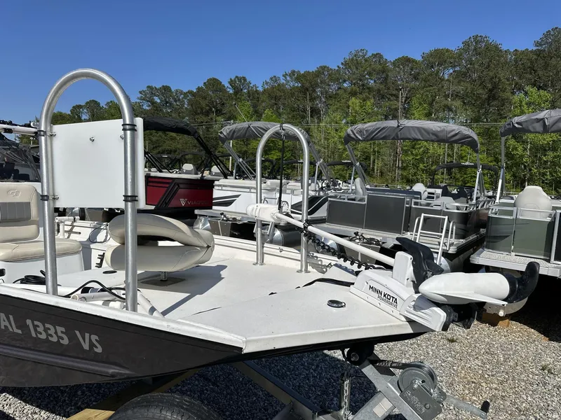 Slide: The Image of Boats displayed outdoors, featuring a 2022 G3 Bay 17 BAY model under clear blue skies. - 4