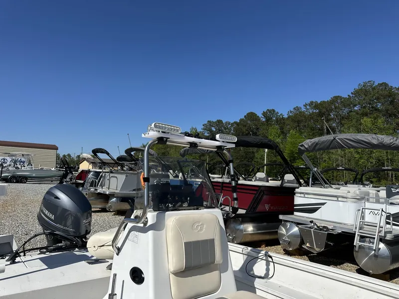 Slide: The Image of 2022 G3 Bay 17 BAY boat with Yamaha motor in a marina under clear blue sky. - 5
