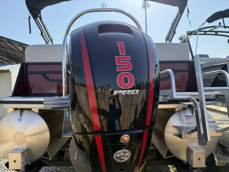 Slide: The Image of 2025 Lowe SS230 boat with a 150 Pro outboard motor, rear view. - 3