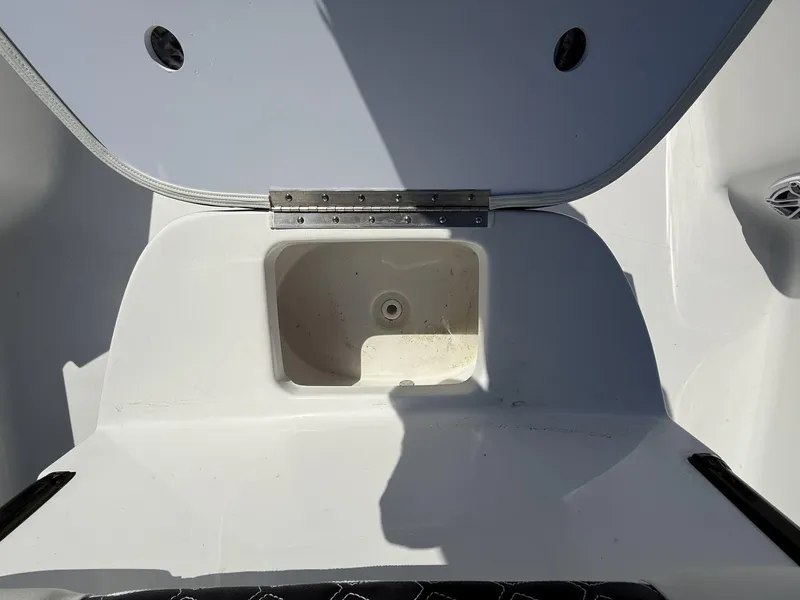 Slide: The Image of Open storage compartment on 2025 Tidewater 2410 Bay Max boat. - 11