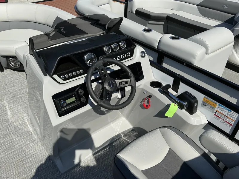 Slide: The Image of 2025 Viaggio Lago V 20 C boat interior with steering wheel and control panel. - 3