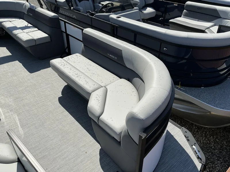 Slide: The Image of Luxurious seating on 2025 Viaggio Lago V 20 C pontoon boat, featuring sleek gray upholstery. - 6