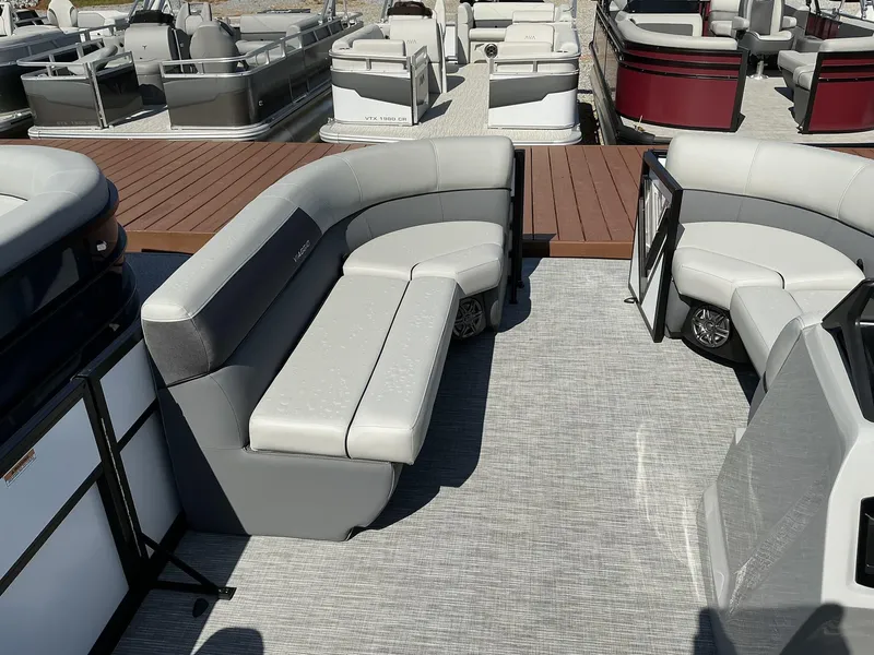 Slide: The Image of Viaggio Lago V 20 C 2025 pontoon boat interior with gray seating and modern design. - 9