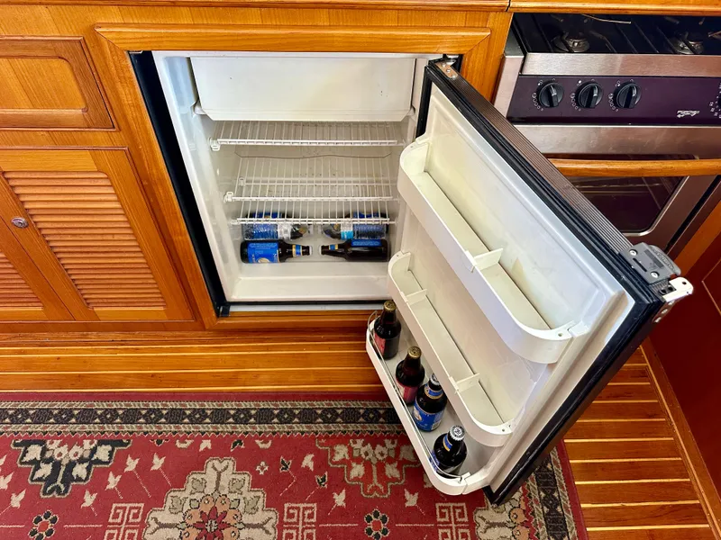 Slide: The Image of Open fridge with drinks inside on Selene Archer 36 yacht, 2006 model. - 17