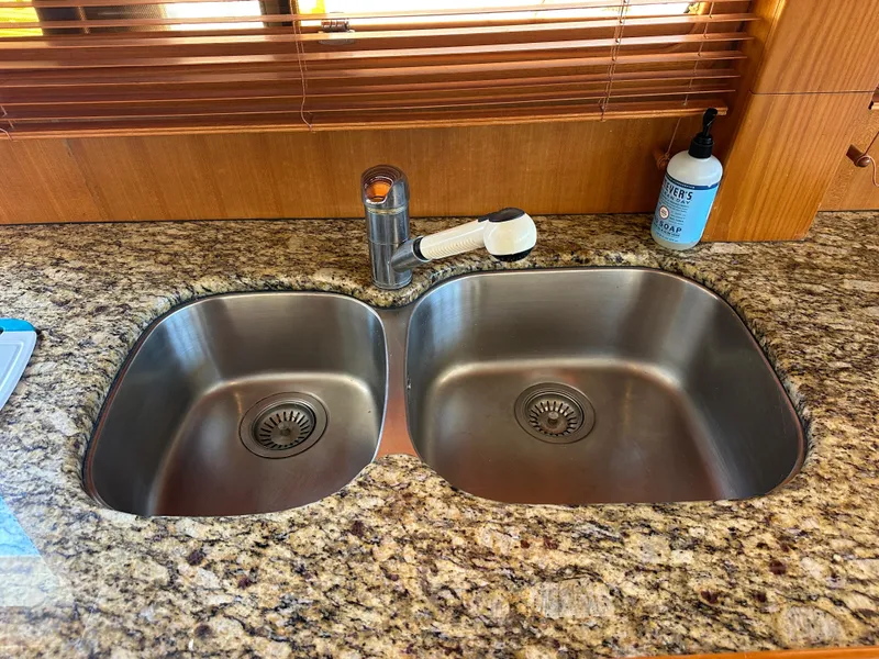 Slide: The Image of Double stainless steel sink on granite countertop in Selene Archer 36 yacht kitchen. - 19