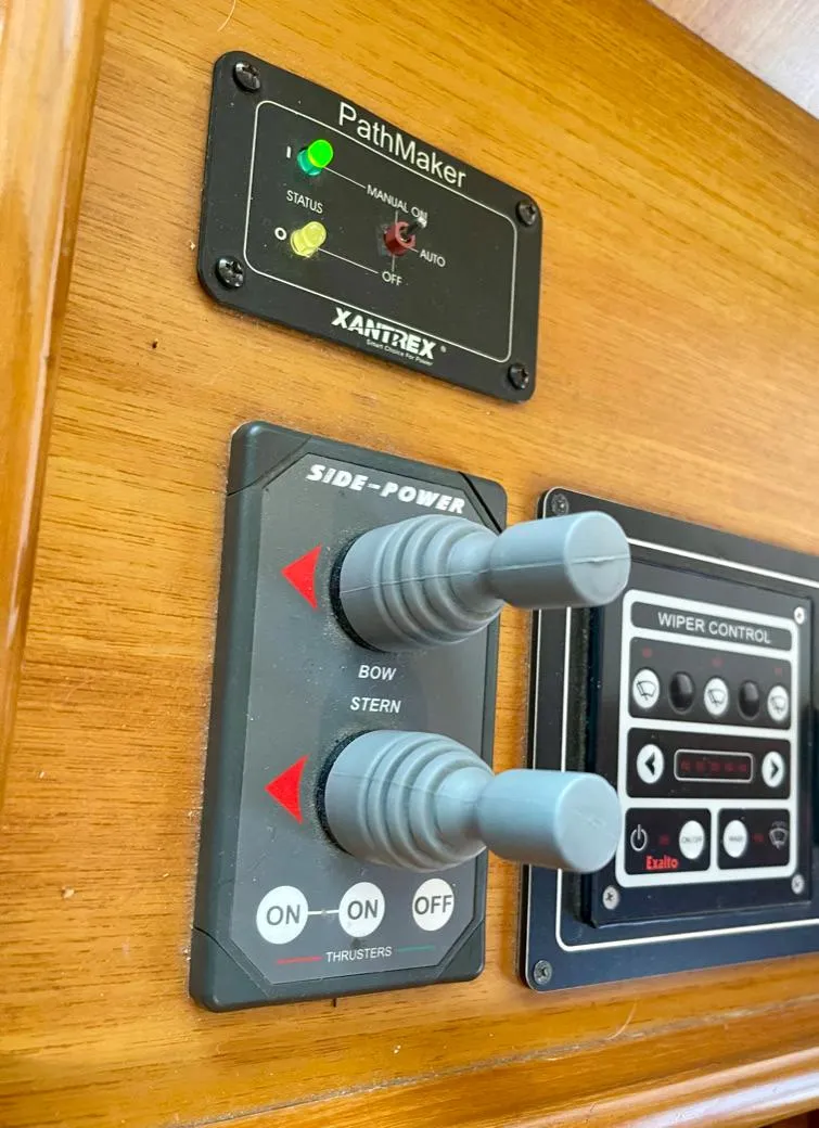 Slide: The Image of Control panel of a 2006 Selene Archer 36 boat with joystick and wiper controls. - 23
