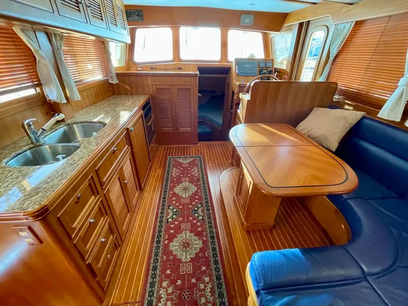 Slide: The Image of Luxurious interior of 2006 Selene Archer 36 yacht with wood finishes and elegant furnishings. - 25