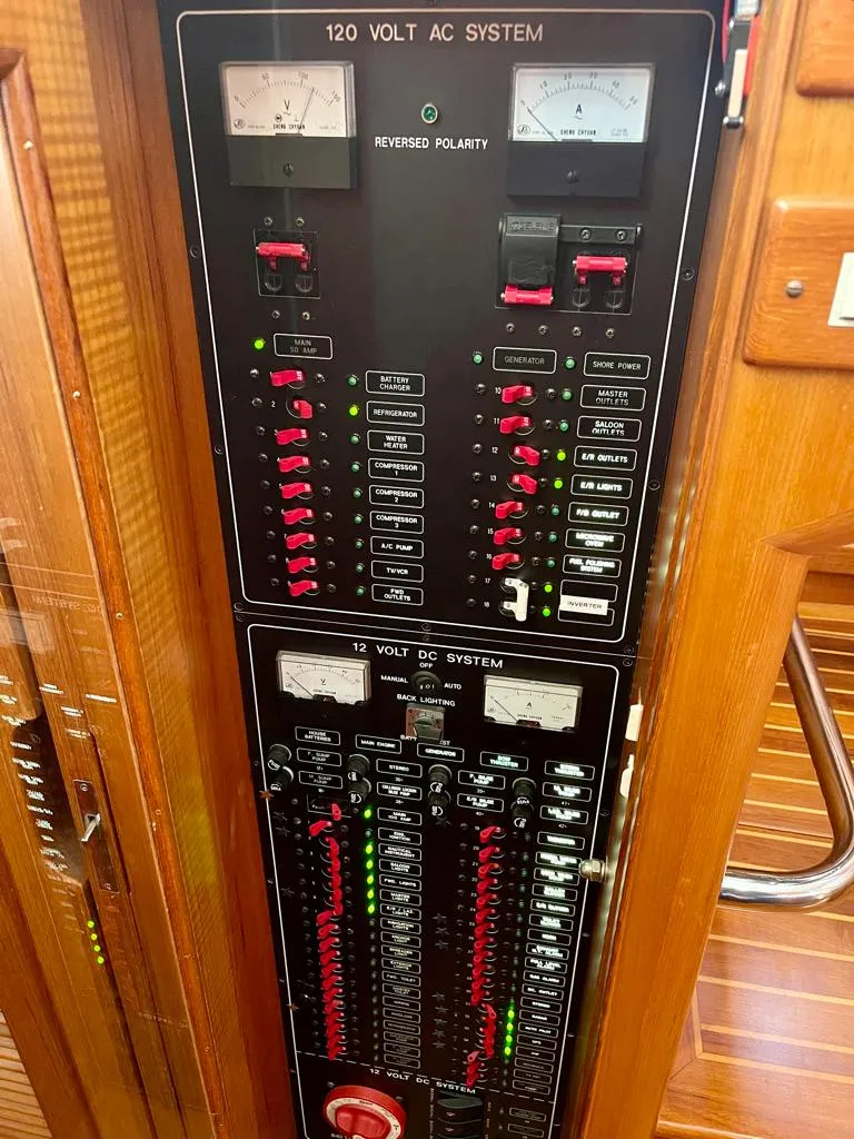 Slide: The Image of Electrical control panel on a 2006 Selene Archer 36 boat, featuring AC and DC systems. - 30