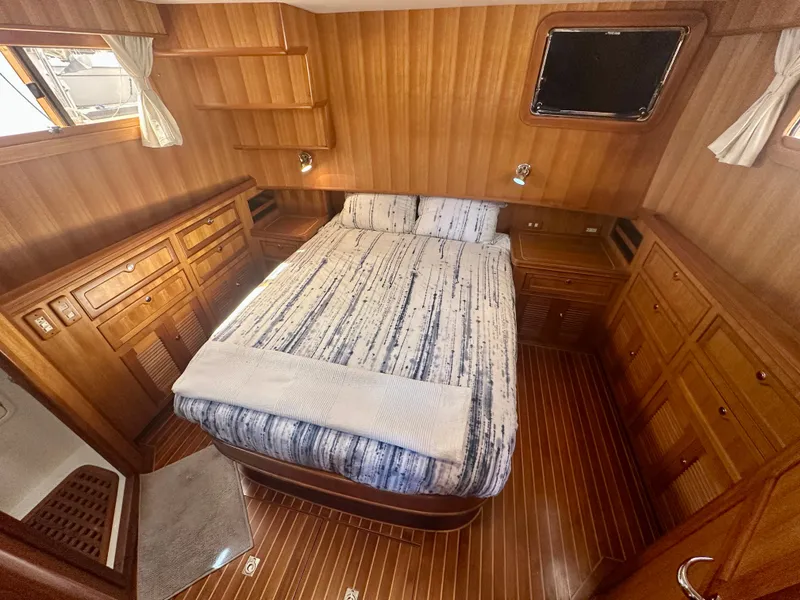 Slide: The Image of Luxurious wooden cabin interior of 2006 Selene Archer 36 yacht with cozy bed and storage. - 31