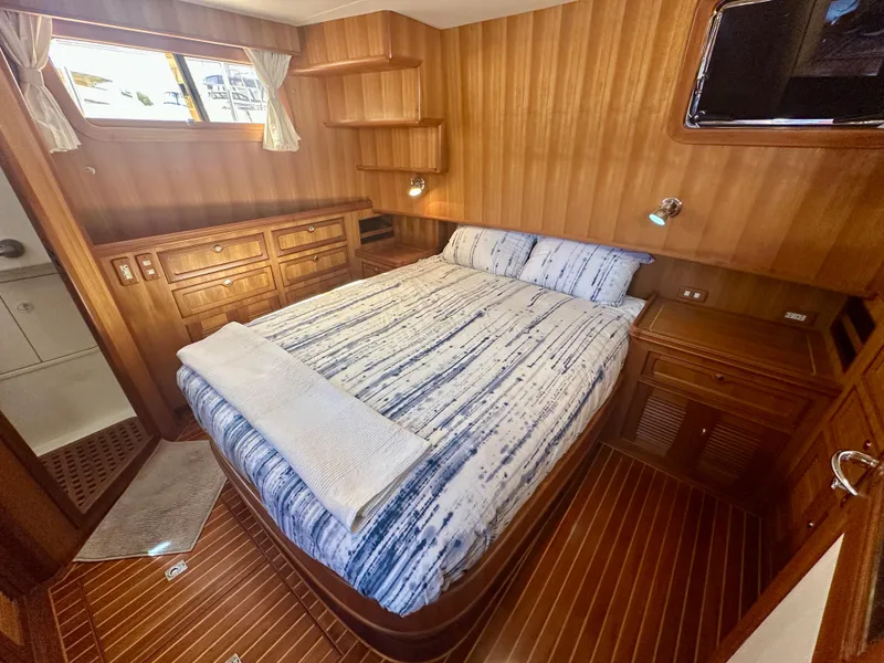 Slide: The Image of Luxurious wooden cabin interior of 2006 Selene Archer 36 yacht with cozy bed and storage. - 33