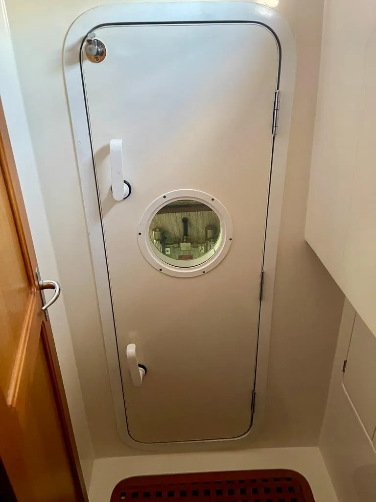 Slide: The Image of Watertight door with porthole on 2006 Selene Archer 36 yacht. - 39