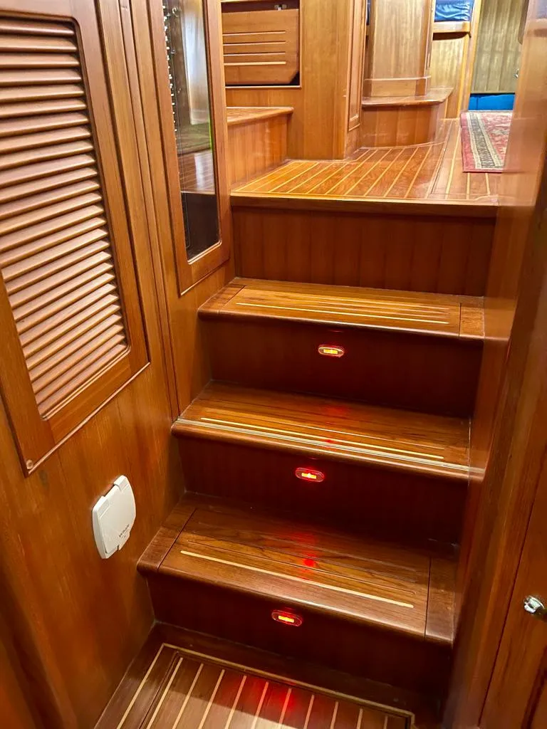 Slide: The Image of Wooden staircase with red LED lights on a 2006 Selene Archer 36 yacht interior. - 43
