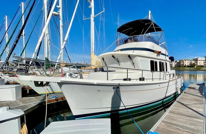 Slide: The Image of Selene Archer 36 yacht, 2006 model, docked at marina under clear blue sky. - 48