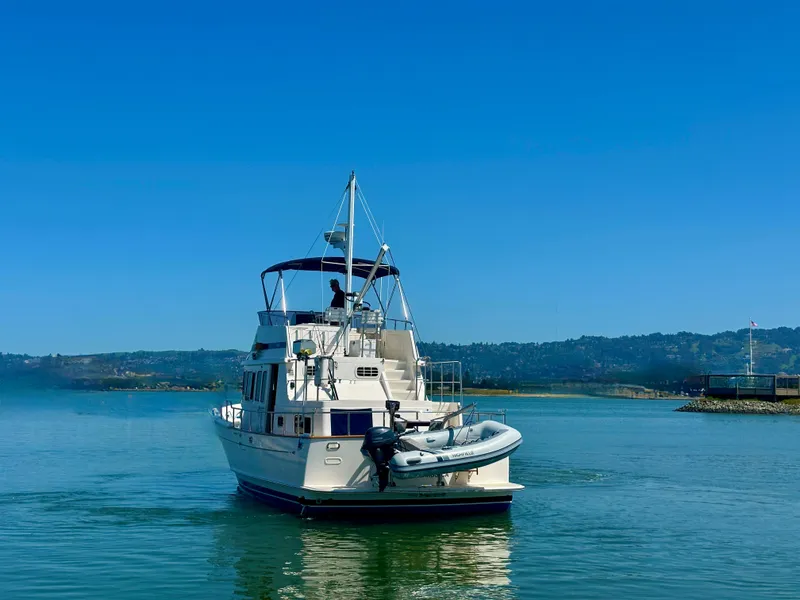 Slide: The Image of Selene Archer 36 yacht from 2006 on calm water under clear blue sky. - 5