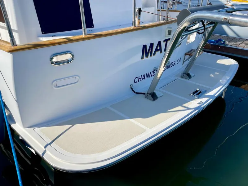 Slide: The Image of Stern view of 2006 Selene Archer 36 yacht docked at marina. - 50
