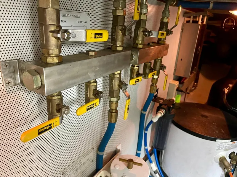 Slide: The Image of Engine room valves and pipes on a 2006 Selene Archer 36 yacht. - 51