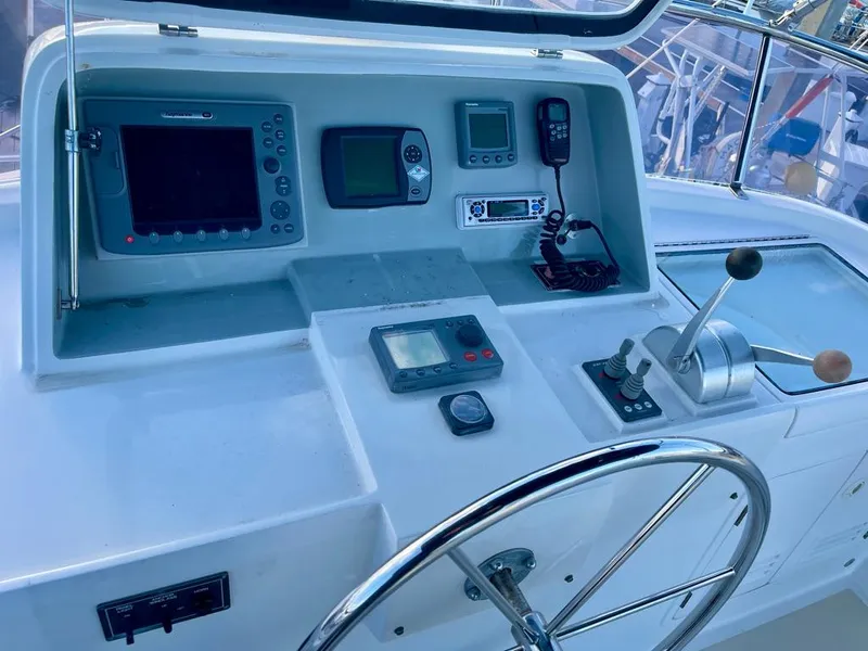 Slide: The Image of Cockpit of 2006 Selene Archer 36 yacht with navigation instruments and steering wheel. - 8