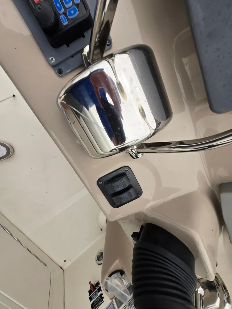 Slide: The Image of Close-up of 2005 Sea Ray 290 Amberjack boat controls and dashboard. - 26