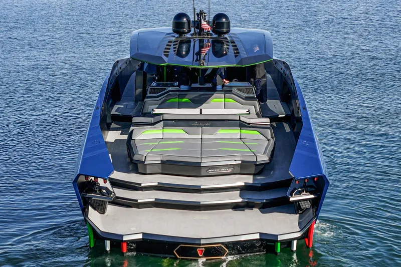 Slide: The Image of 2023 Tecnomar Lamborghini 63 yacht on water, showcasing sleek design and luxury features. - 24