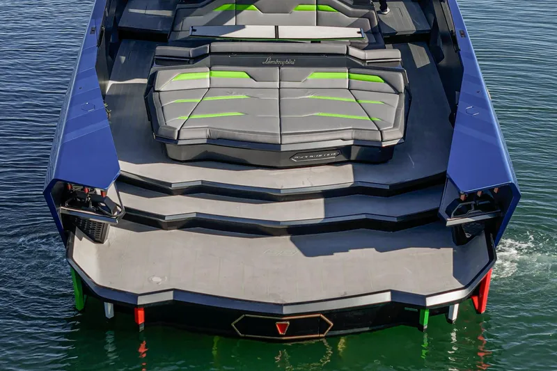 Slide: The Image of 2023 Tecnomar Lamborghini 63 yacht, rear view with sleek design and vibrant accents. - 25