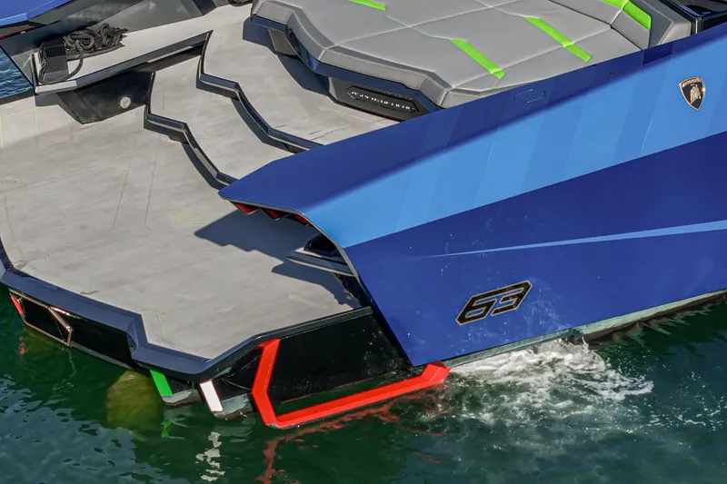 Slide: The Image of 2023 Tecnomar Lamborghini 63 yacht, sleek blue design, luxury watercraft detail. - 28