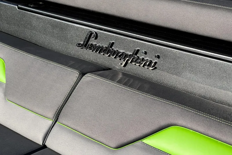 Slide: The Image of Interior detail of 2023 Tecnomar Lamborghini 63 yacht with logo and green accents. - 32