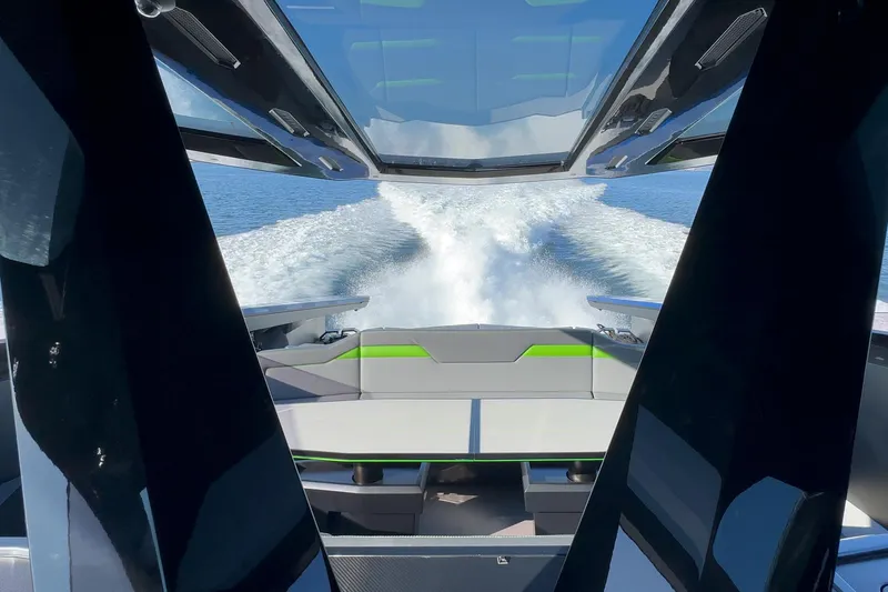 Slide: The Image of 2023 Tecnomar Lamborghini 63 yacht cruising on open water, rear view. - 38