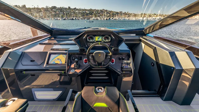 Slide: The Image of Cockpit of 2023 Tecnomar Lamborghini 63 yacht with modern controls and waterfront view. - 46