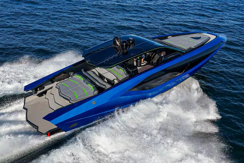 Slide: The Image of 2023 Tecnomar Lamborghini 63 yacht cruising on open water, showcasing sleek design and luxury. - 6