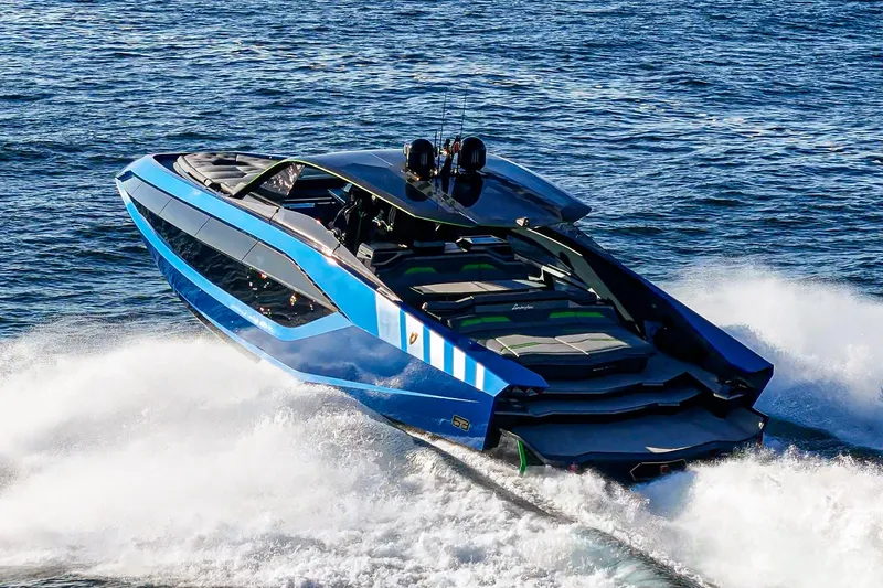 Slide: The Image of 2023 Tecnomar Lamborghini 63 yacht cruising on open water, showcasing sleek design and luxury. - 9