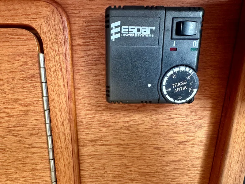 Slide: The Image of Espar heater control on 1988 C&C MKII wooden interior panel. - 21